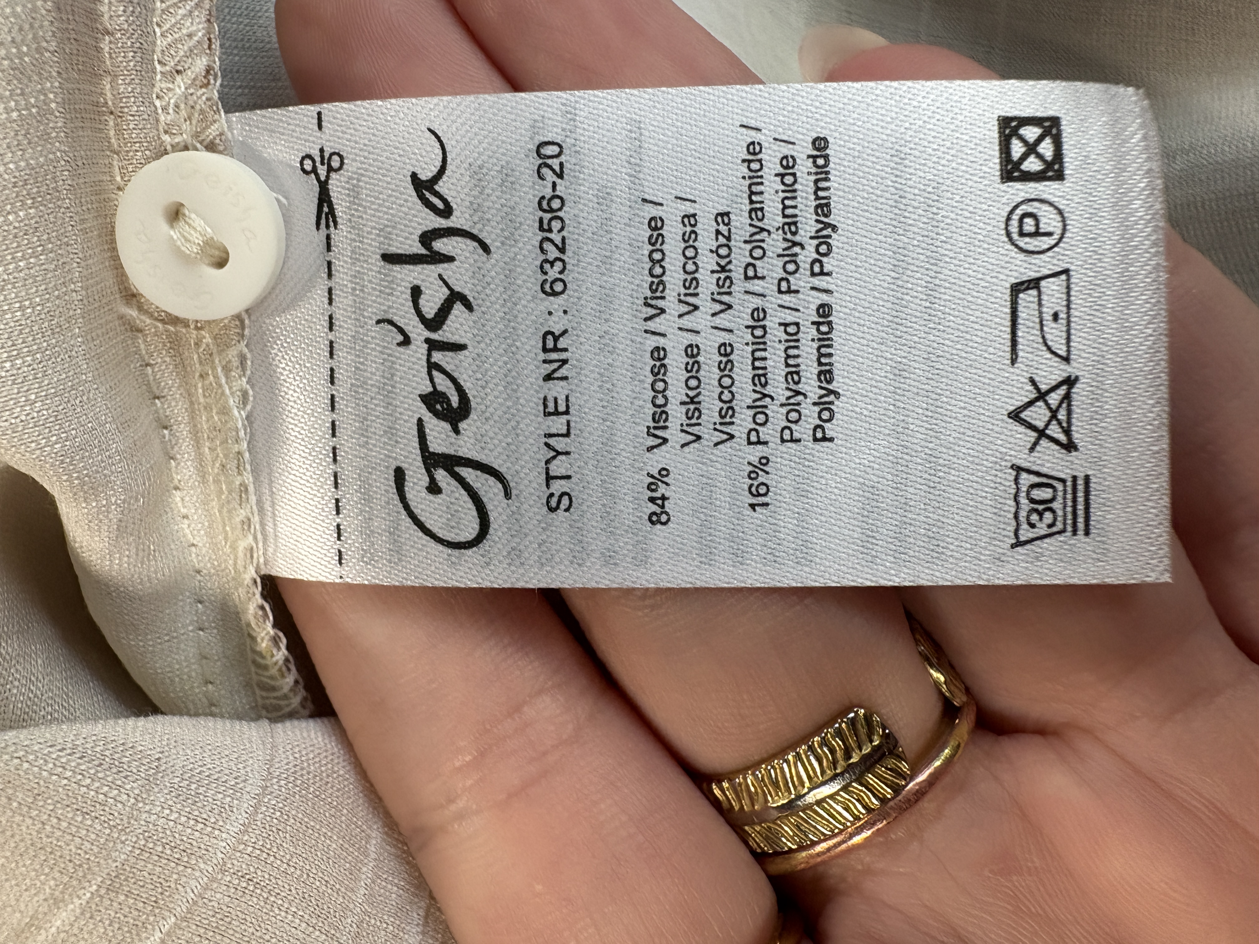 Aangeleverde labelscan met wassymbolen